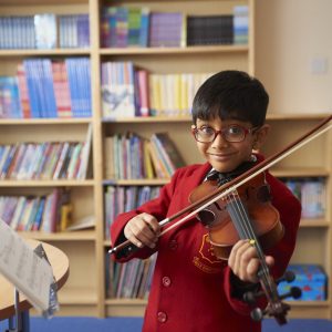 student playing the violin