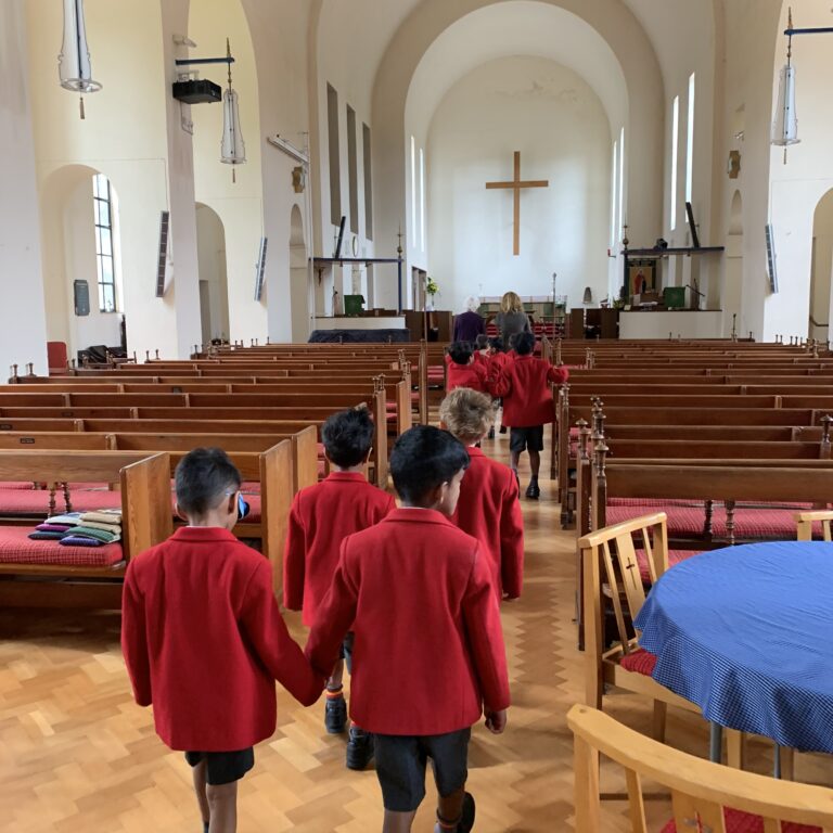 students walking through a church
